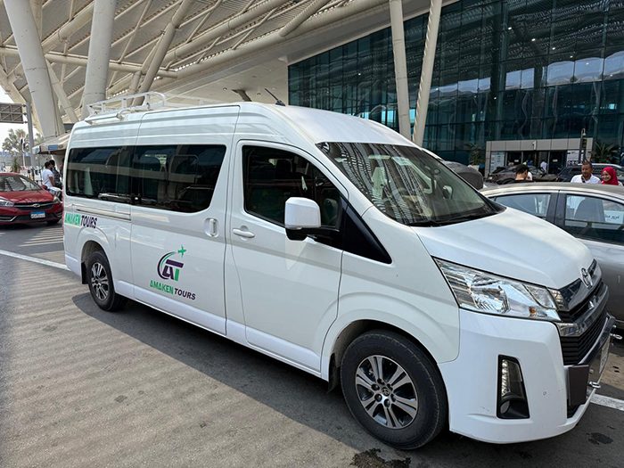 Amaken Tours minivan at Cairo International Airport